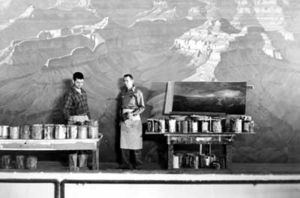 Artist Delmer J. Yoakum (left) painting the Grand Canyon diorama in 1955.