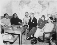 Hurley conversing with Chinese Communist leadership after promotion to Ambassador to China