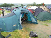 A river runs through one unfortunate punter's tent after two inches of rain were dropped in an hour on Friday morning of the 2005 festival.