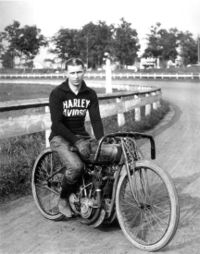 Ralph Hepburn races his Harley in this 1919 photo.