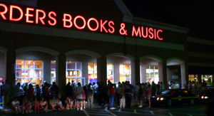 Crowds wait outside a Borders store in Delaware for the midnight release of the book