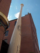 A giant baseball bat adorns the outside of Louisville Slugger Museum in downtown Louisville