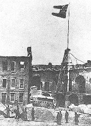 1861, inside the fort flying the Confederate Flag.