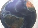 Plate tectonics - seafloor spreading and continental drift illustrated on relief globe
