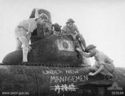 Australian sailors take possession of a midget submarine at a Japanese naval base near Toyko in September 1945