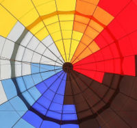 The inside of a hot air balloon's envelope, seen from the gondola.