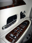 The redesigned door panels with new seat controls and additional wood trim