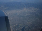 West Los Angeles from the air, showing the communities of Santa Monica, Westwood, and Marina del Rey, and the San Fernando Valley (in background)