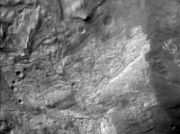 The first image by the HiRISE camera shows the Ius Chasma section of the Valles Marineris system of canyons.