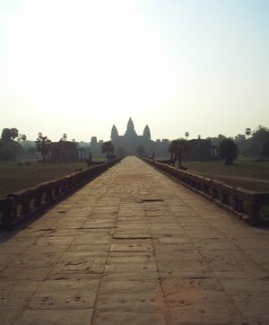 The naga bridge of Angkor Wat at sunrise.