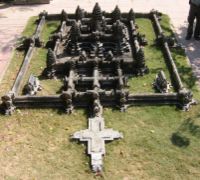 A view along the main axis of a model of Angkor Wat: in the foreground is the cruciform terrace which lies in front of the central structure.