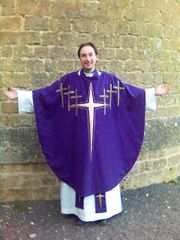 An Anglican priest in eucharistic vestments. Many Anglican clergy vest in a similar way to Roman Catholic clergy, especially at the Eucharist. While the chasuble is often considered to be more "high church" by some Anglicans, the alb and stole have become common vesture.