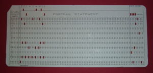 A 1970s punched card containing one line from a FORTRAN program. The card reads: "Z(1) = Y + W(1)" and is labelled "PROJ039" for identification purposes.