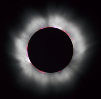 During a total solar eclipse, the sun's atmosphere is more apparent to the eye.