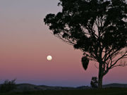 Moon over red and blue haze