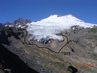 Easton Glacier (on the south flank) in 2003. The superimposed black line marks how far the glacier was in 1985.