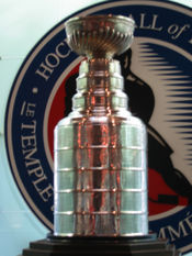 Stanley Cup, on display at the Hockey Hall of Fame, is awarded to the league champion.