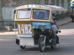 A motorized pedicab in Dumaguete City.