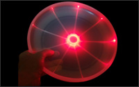 A flying disc illuminated by fiber optics
