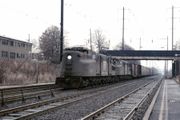 Penn Central #4801 and #4800 haul freight through North Elizabeth, New Jersey in December of 1975.