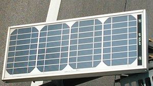 A photovoltaic module that is composed of individual PV cells.  A PV array is a linked assembly of modules.