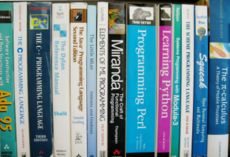 A selection of textbooks that teach programming, in languages both popular and obscure.  These are only a few of the thousands of programming languages and dialects that have been designed in history.