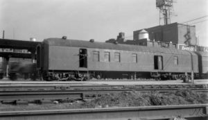 Union Pacific Railroad #2242, a smooth-sided baggage-RPO car, passes through Denver, Colorado on June 5, 1949.