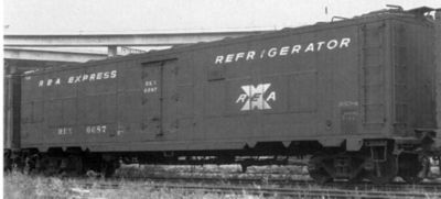 Railway Express Agency refrigerator car #6687, a converted World War II "troop sleeper." Note the square panels along the sides that cover the former window openings.