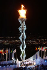 The Olympic flame burns at Rice-Eccles Stadium. Salt Lake City hosted the 2002 Winter Olympics.