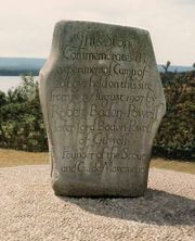 Stone on Brownsea Island commemorating the first scout camp