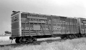 A Union Pacific wood stock car fitted with metal ends.