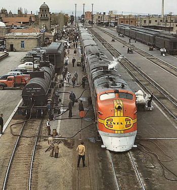 A view of the Super Chief being serviced at the Albuquerque, New Mexico depot in March of 1943.  Note the presence of a headlight "blackout shield" (a Civil Defense requirement as the train operated in the Pacific Coast region).