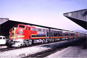 The combined Super Chief / El Capitan, led by locomotive #44C (an EMD F7 sporting Santa Fe's classic Warbonnet paint scheme) pulls into Track 10 at Los Angeles' Union Passenger Terminal (LAUPT) on September 24, 1966.