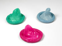 Three colored condoms