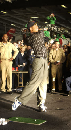 Tiger Woods giving a driving demonstration aboard the USS George Washington.