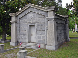 Mahone mausoleum at Blandford Cemetery, identified by its "M" insignia.