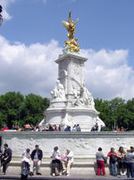 Victoria Memorial was created by the sculptor Sir Thomas Brock in 1911 and erected in front of the main gates at Buckingham Palace on a surround was constructed by the architect Sir Aston Webb.