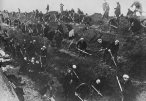 Factory workers dig anti-tank trenches around Moscow in 1941.