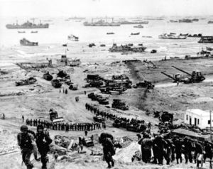 The build-up of Omaha Beach: reinforcements of men and equipment moving inland.