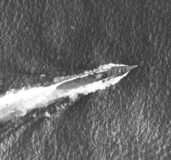 Japanese cruiser Chikuma under attack on October 26.  The white spot in the center of the ship is where one of the 1,000 bombs hit directly on the bridge, causing heavy damage and high casualties.