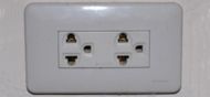 A standard grounded Thai outlet supporting all common 2 pin plugs and also earthed american plugs