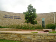 The HOPE Columbine Memorial Library now stands as a memorial at the High School. Partially built at the site where the massacre began, it replaced the older library where most of the massacre unfolded.