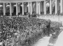 Coolidge addressing a crowd at Arlington National Cemetery's Roman style amphitheater in 1924.