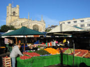 The market in the centre of Cambridge, with Great St Mary's Church in the background · more [1]