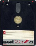 The CF has a harder casing than a 3½-inch floppy; the metal door is opened by a sliding plastic tab on the right side.