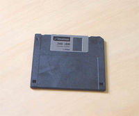 The non-ferromagnetic metal sliding door protects the 3½-inch floppy disk's recording medium.