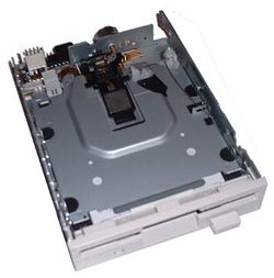 The 3½-inch floppy disk drive automatically engages when the user inserts a disk, and disengages and ejects with the press of the eject button.  On older Macintosh hardware, the disk is lowered into the carriage and ejected by a motor (similar to a VCR).  To eject a disk on a Mac running OS X one would traditionally drag the icon of the floppy-disk over the Trash until it turns into an eject icon, then release.