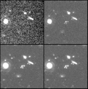 A section of the HDF about 14 arcseconds across in each of the four wavelengths used to construct the final version: 300 nm (top left), 450 nm (top right), 606 nm (bottom left) and 814 nm (bottom right).