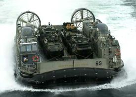 An LCAC carrying armored vehicles ashore during the invasion of Iraq.