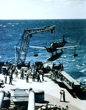 USS Missouri recovers a Vought OS2U Kingfisher during her 1944 shakedown cruise. Note the catapult below the plane, which was used to launch the planes off the battleship.